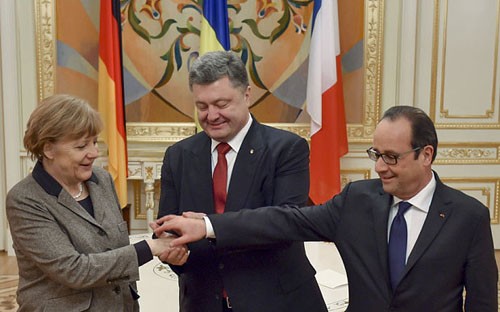 Germany, France urges Ukraine to grant self-rule to eastern regions - ảnh 1